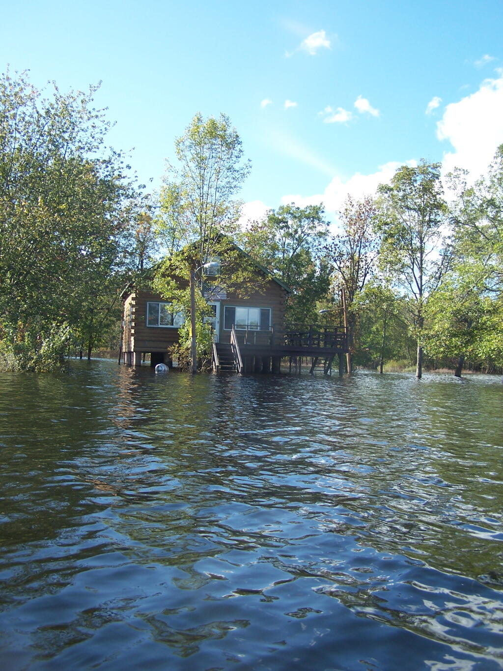 House on Stilts Surrounded By Water