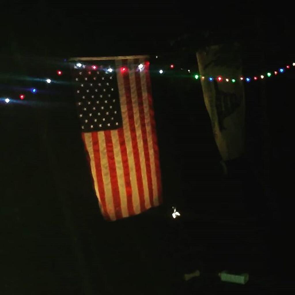 Left the flag lit up sitting in the truck cap in the rain