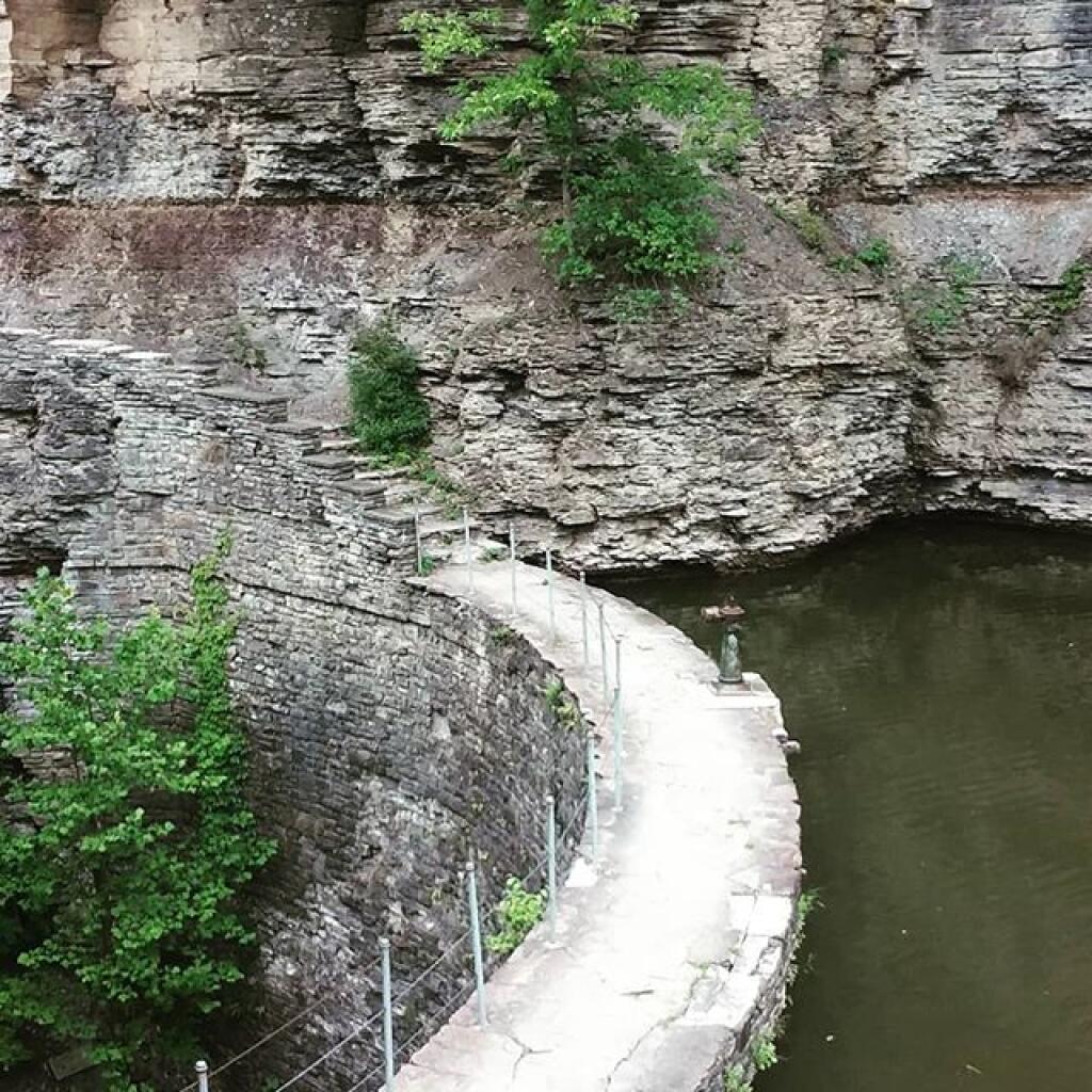 Almost all of the gorge state parks have reservoirs above them to store water. Lake Treman Dam, note stone walkway up the cliff.