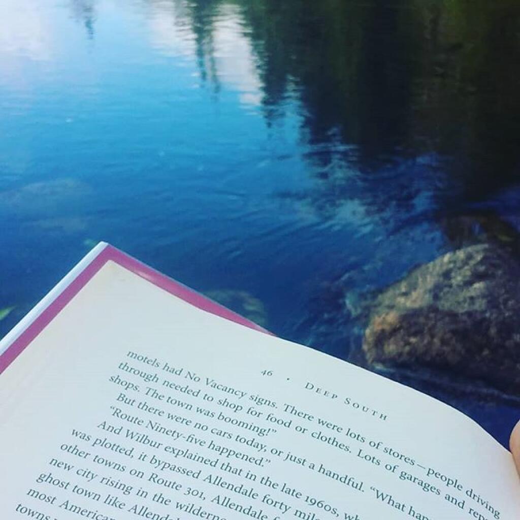 Swimming hole with a good book
