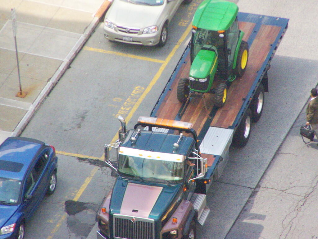Photo: Farm Tractor on Truck