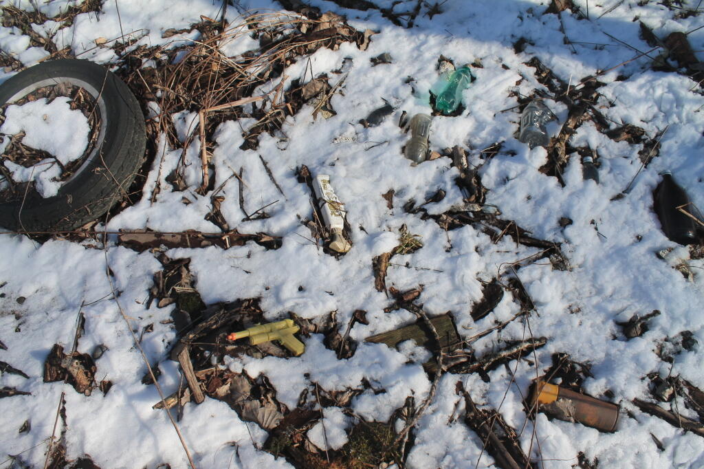 Photo: A Gun and Miscellaneous Debris