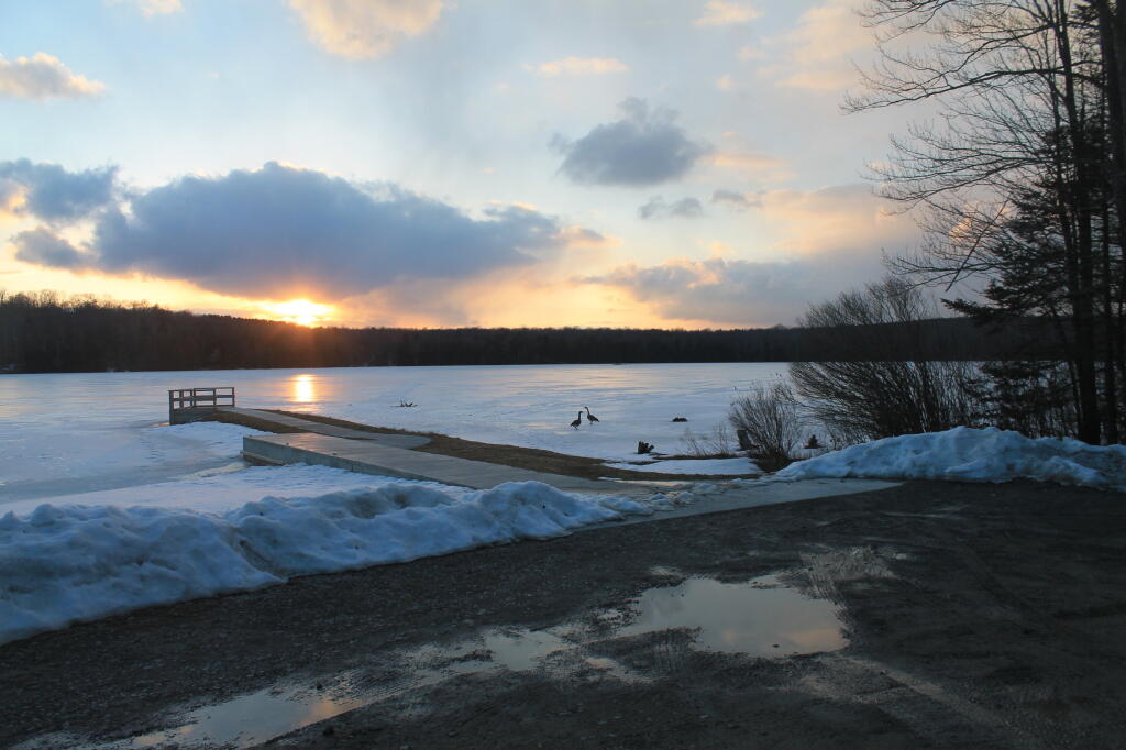 Photo: Setting Sun Over Boat Dock
