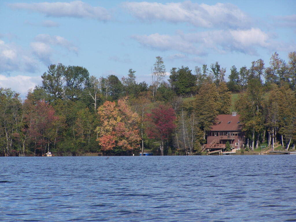Photo: House with Farm Field Beyond It
