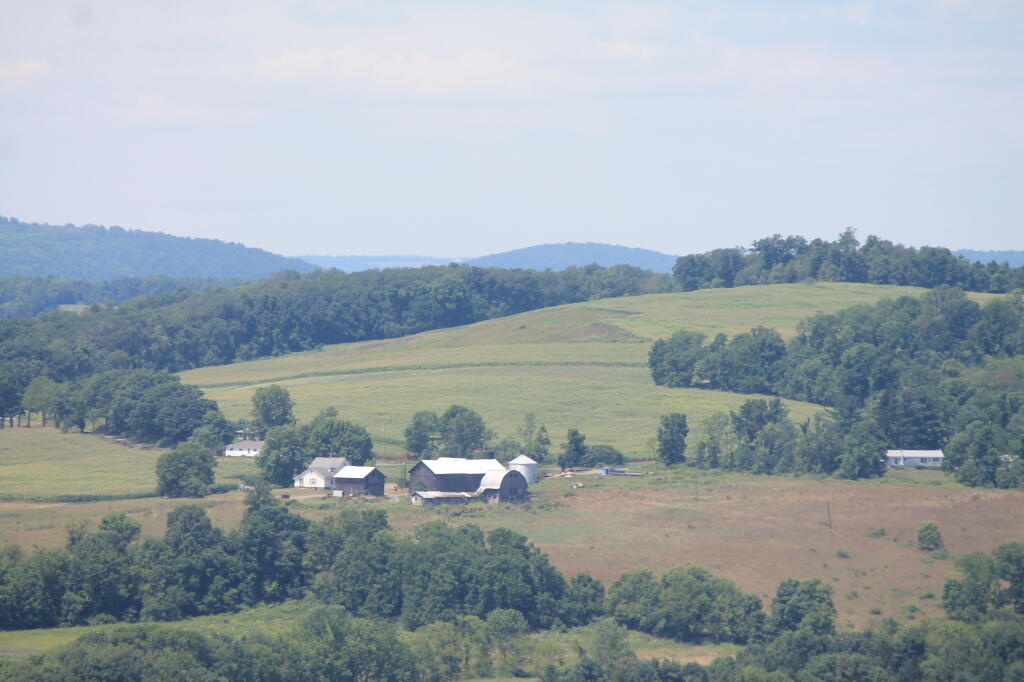 Photo: Farm High Above the River