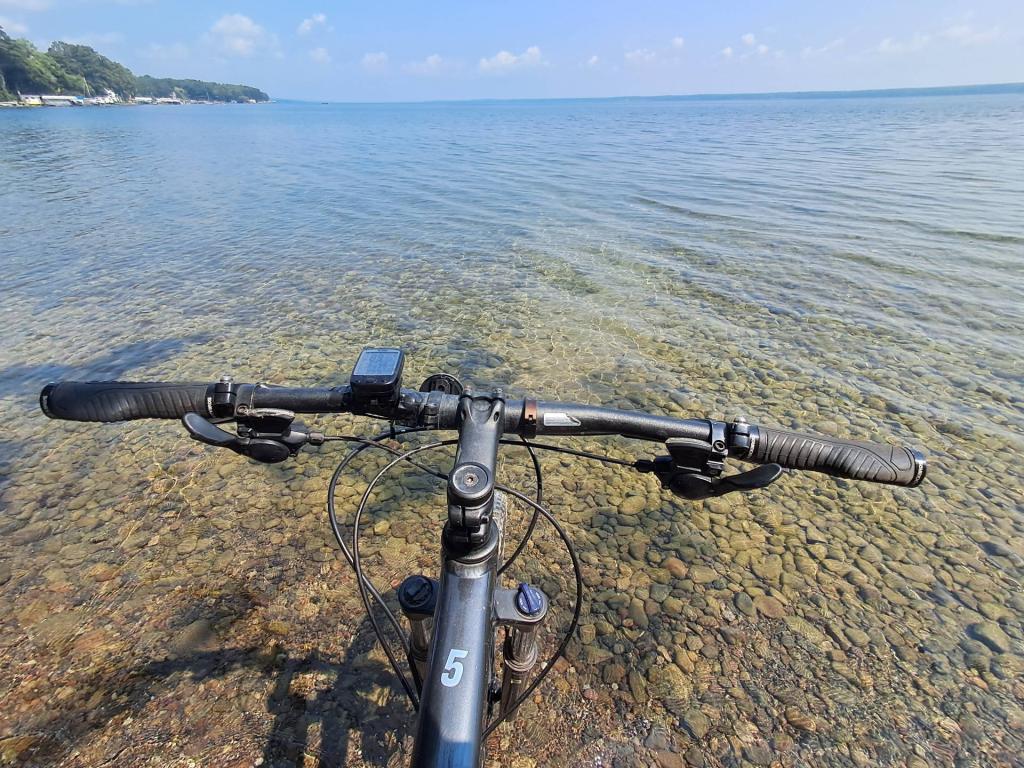 Photo: I do maintain one must touch the waters of Seneca and Kueka Lakes when riding the Keuka Outlet Trail