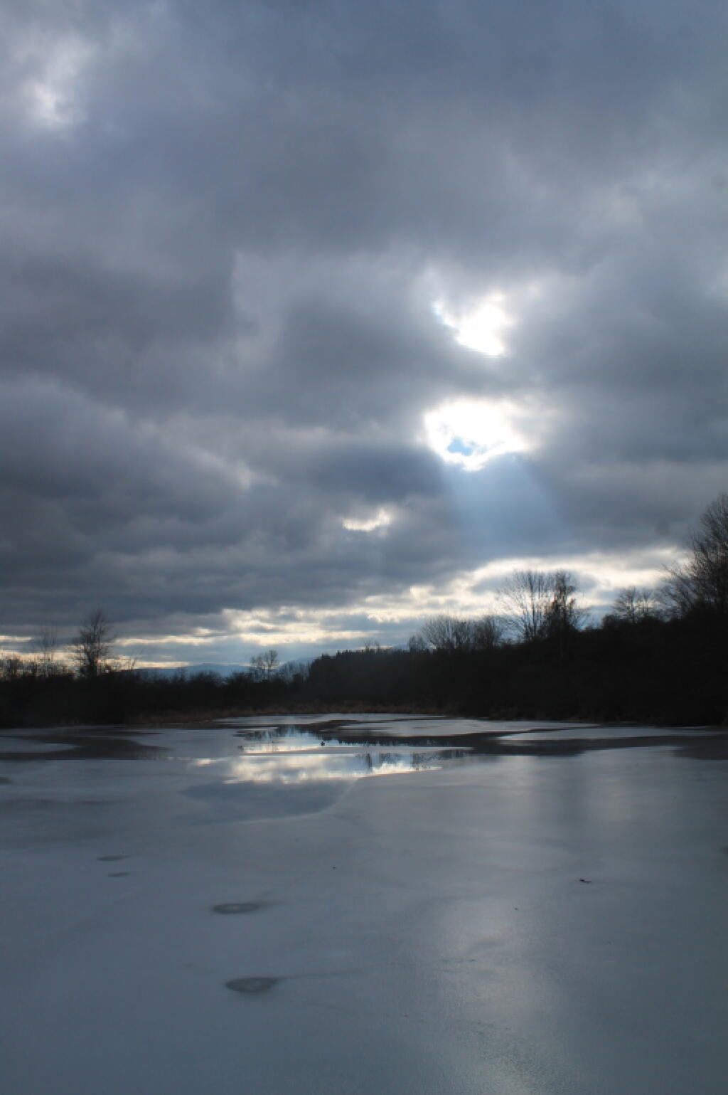 Photo: God Rays on the Pond