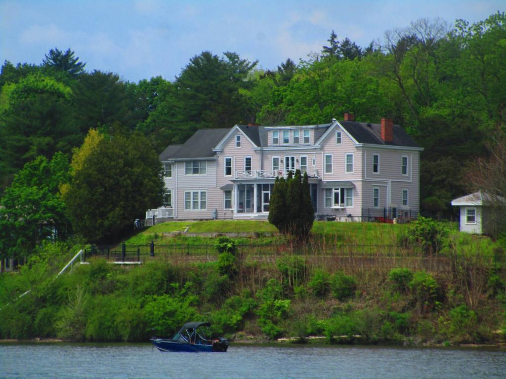 Photo: Stately old house on the other side of the river [Expires May 24 2026]