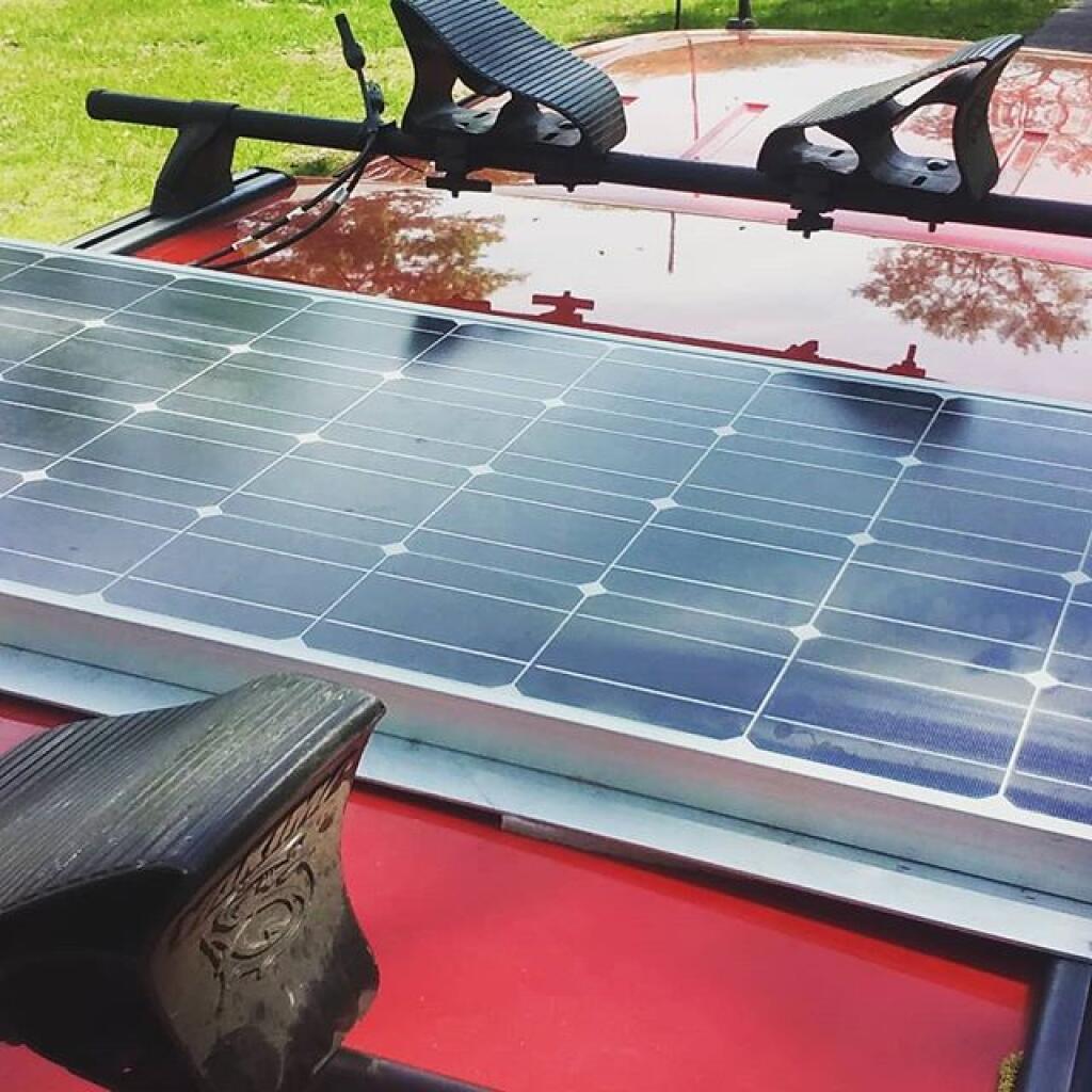 Photo: Solar panel installed to top off battery when camping multiple days