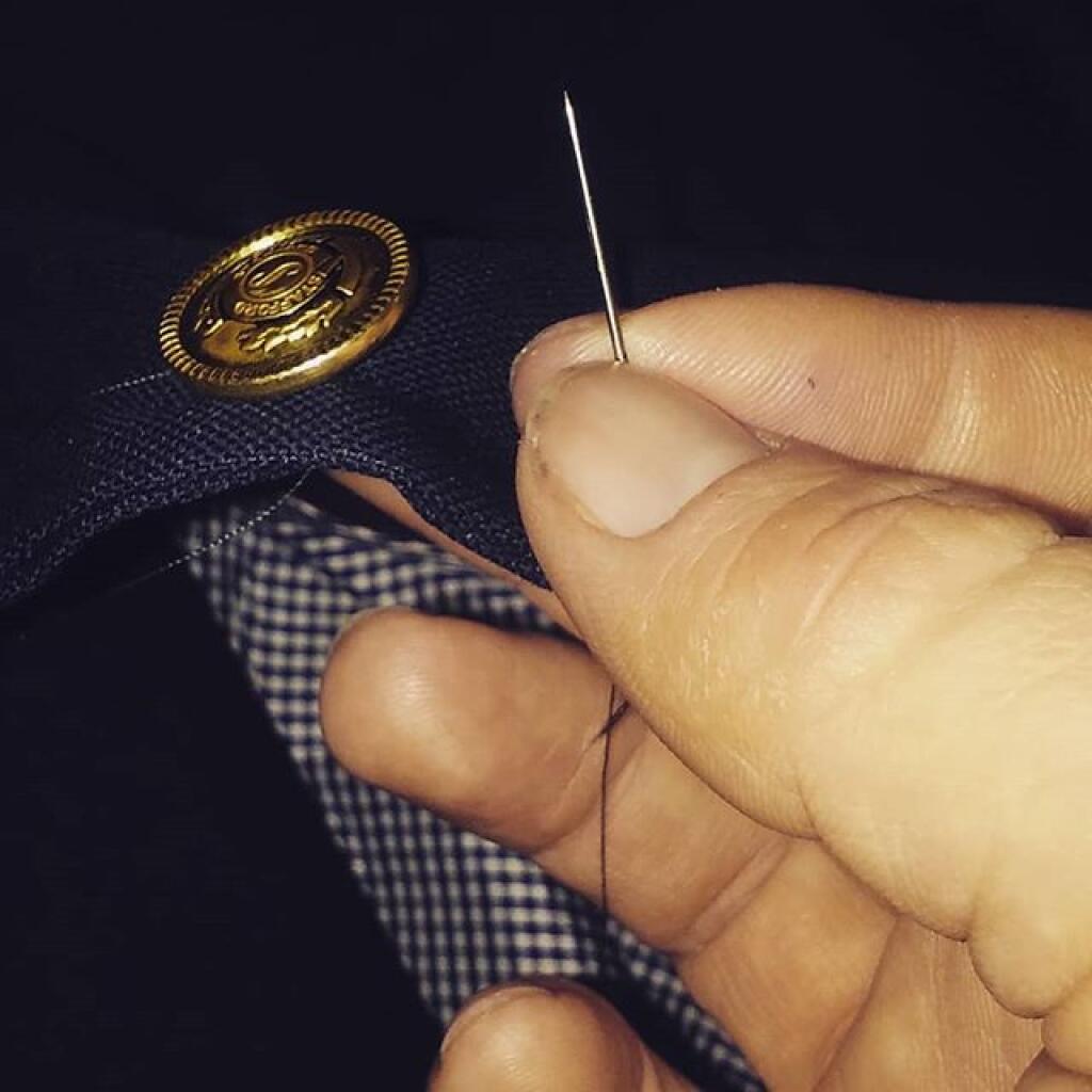 Photo: Sometimes you just have to sew back on your lost buttons